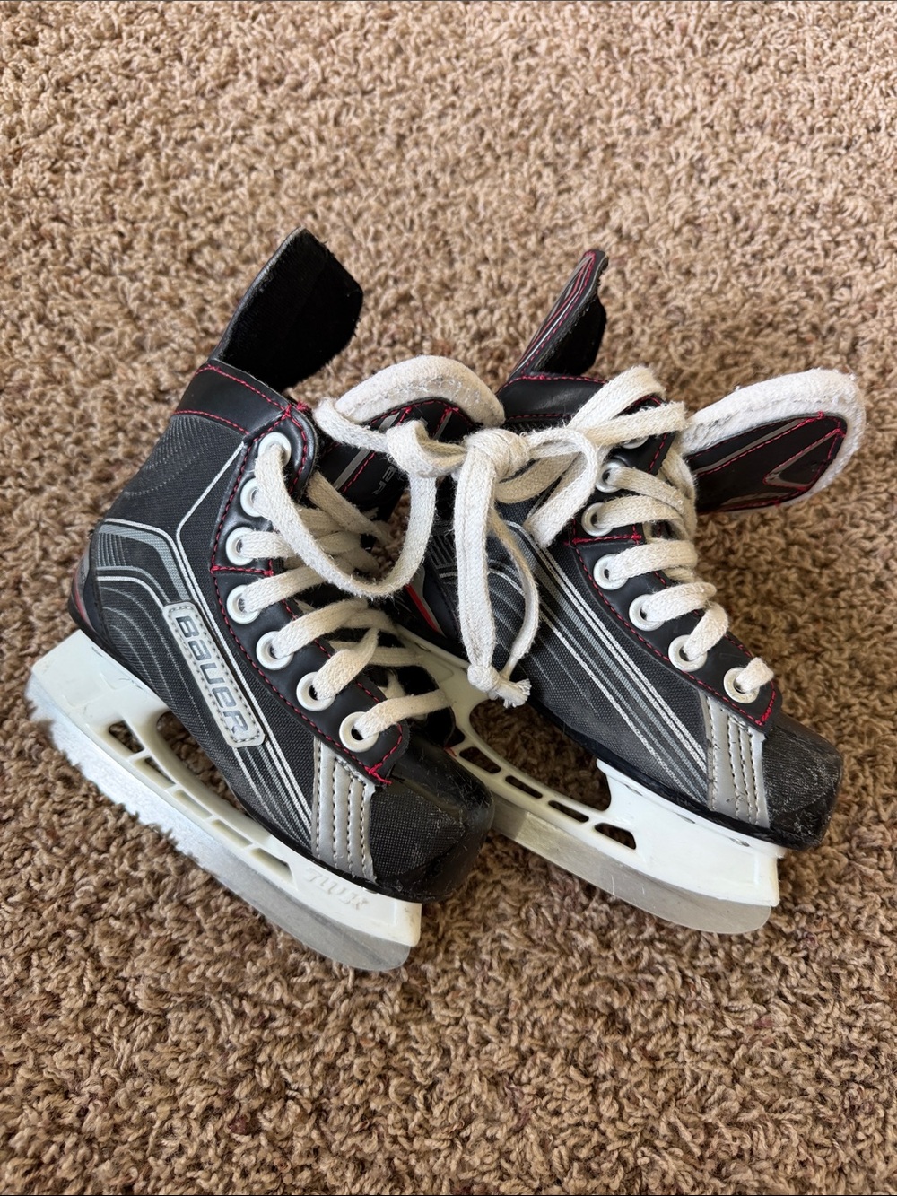 Bauer Black & White Junior Hockey Skates with Red Accents